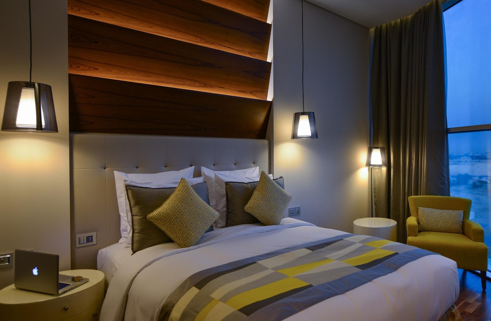 The Avenue Hotel Doha Exteriör bild A bedroom at the hotel