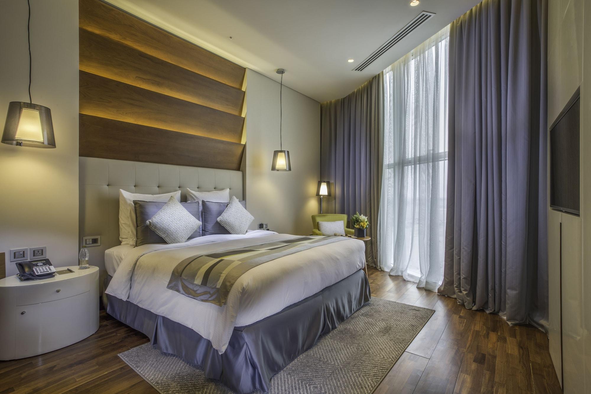 The Avenue Hotel Doha Exteriör bild Deluxe Room