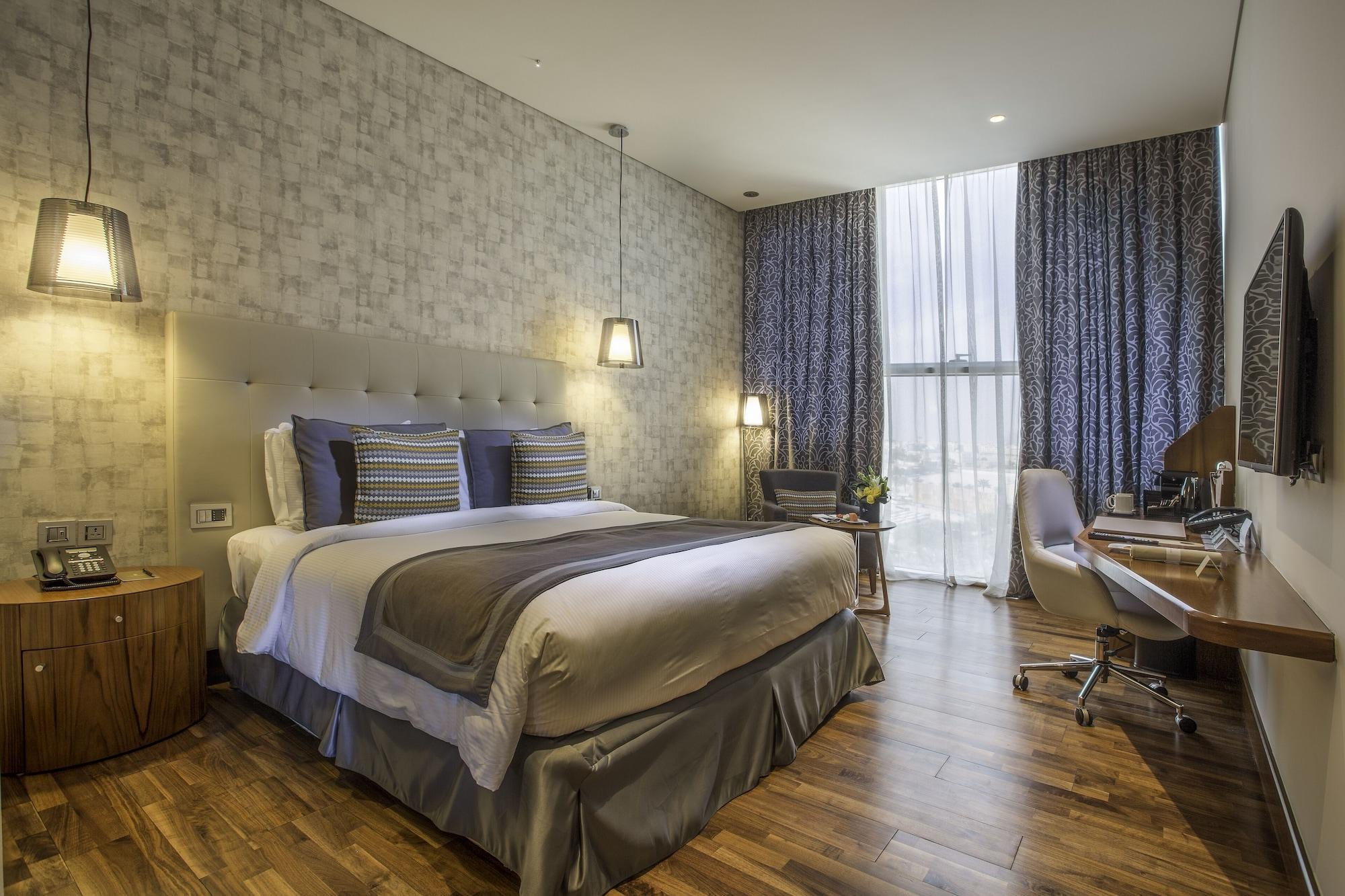 The Avenue Hotel Doha Exteriör bild Deluxe room