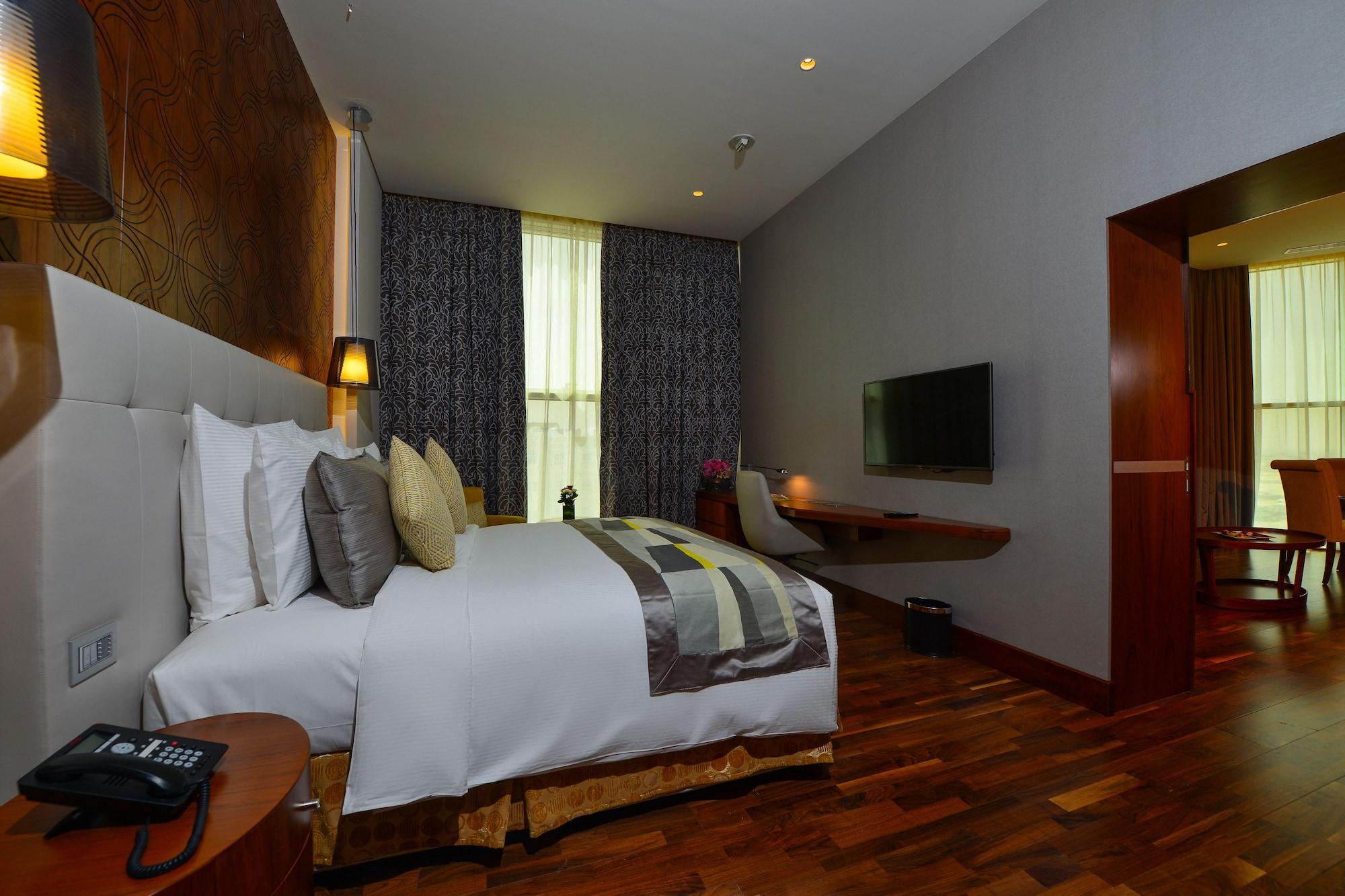 The Avenue Hotel Doha Exteriör bild A bedroom at the hotel