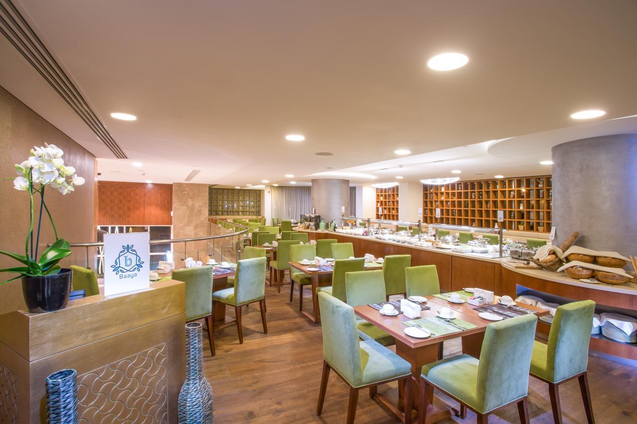 The Avenue Hotel Doha Exteriör bild The interior of the restaurant