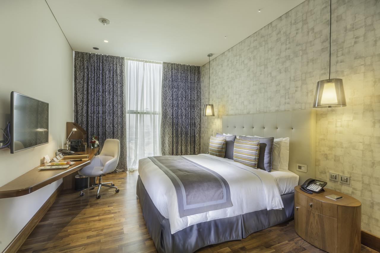 The Avenue Hotel Doha Exteriör bild Deluxe room