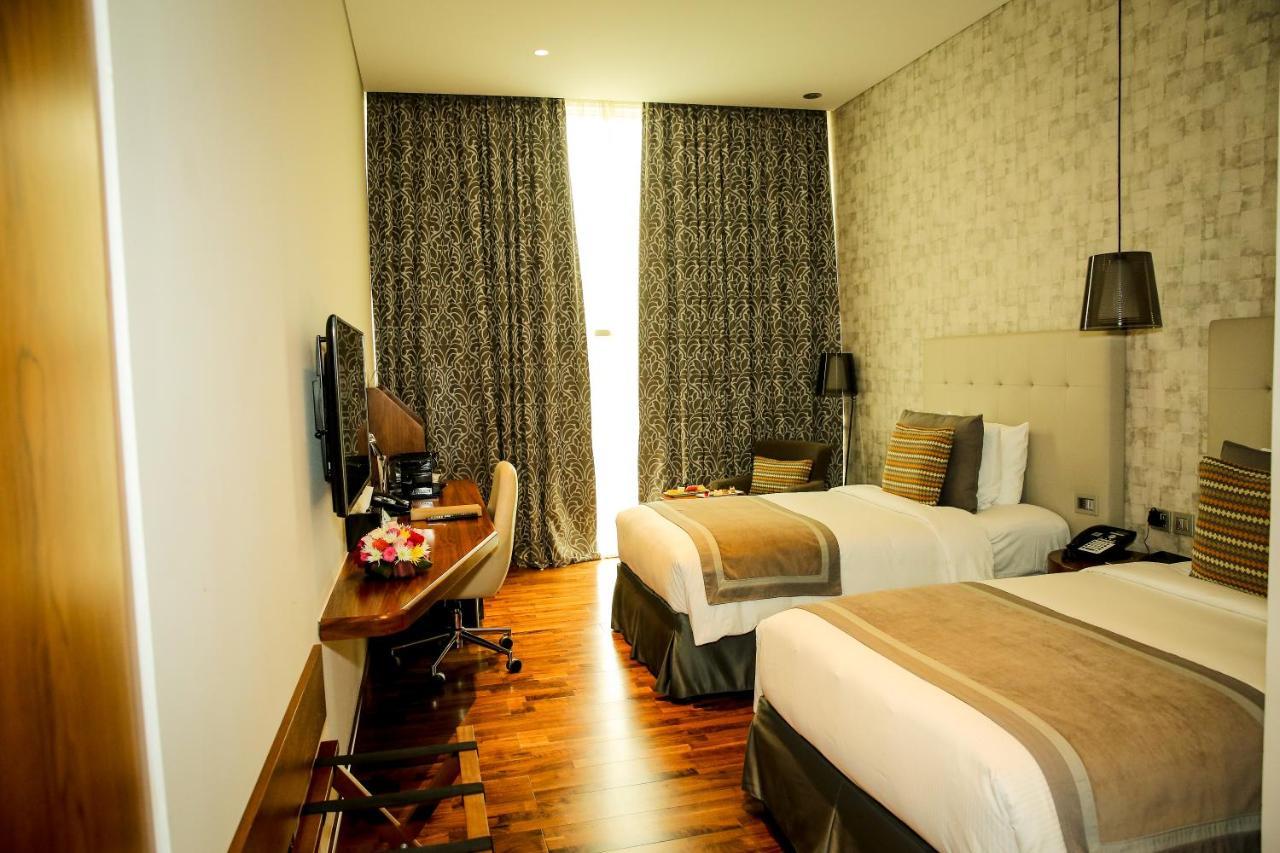 The Avenue Hotel Doha Exteriör bild Deluxe Room
